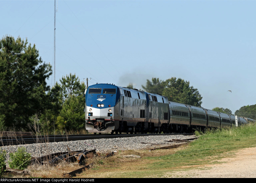 AMTK 77 leads a late train P092-27 past the Fairgrounds